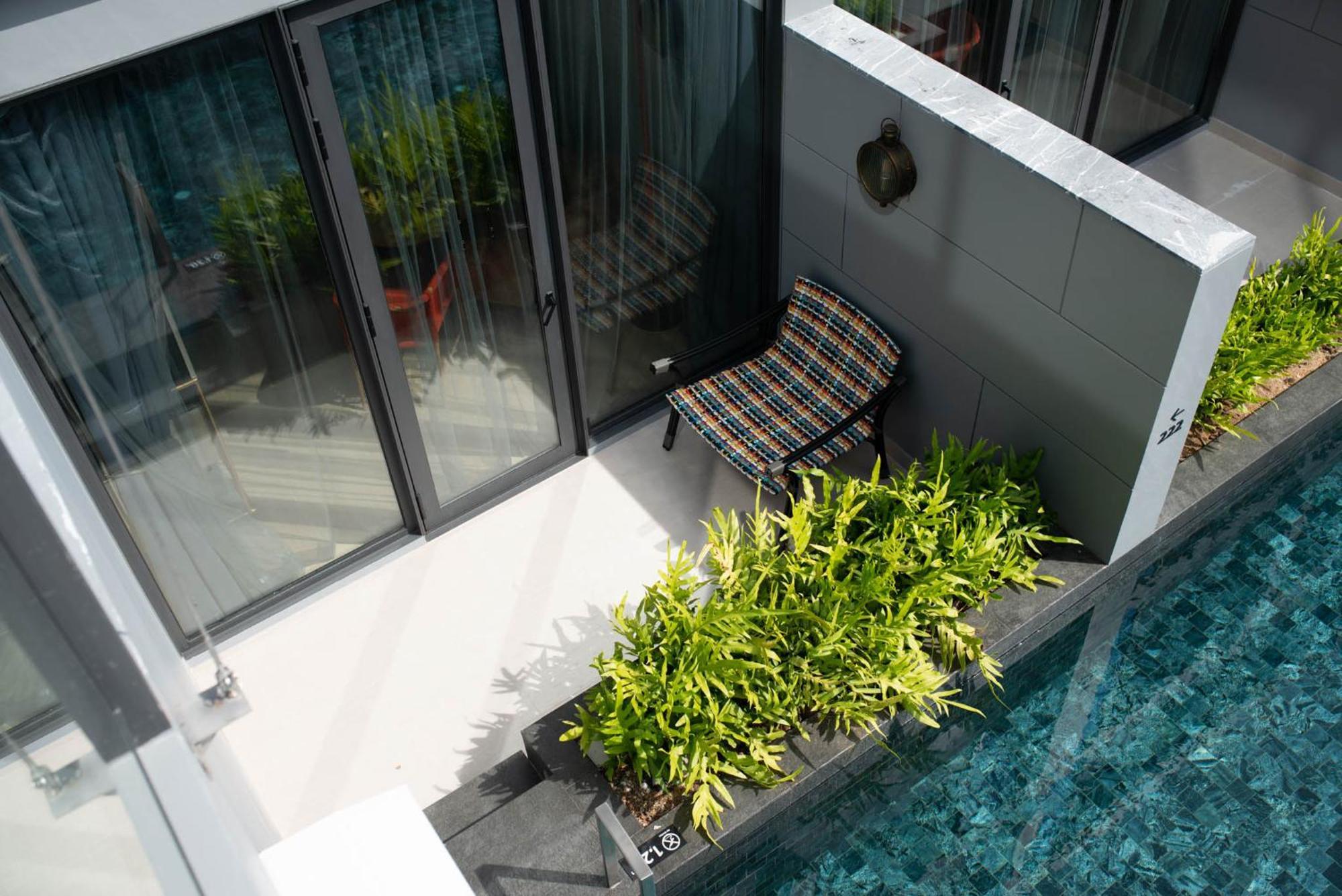 Hotel Indigo Phuket Patong By Ihg Exterior foto A private pool at a landed property in Singapore